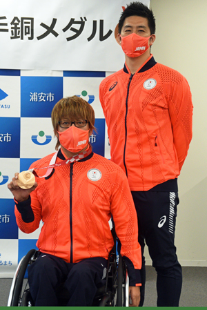 写真：池崎選手と伊佐トレーナー