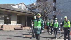 写真：第8区自治会のじゃらん棒見守り隊の活動の様子